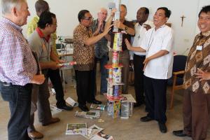 Newspaper Tower, group dynamic led by Theo