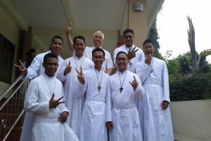 Brothers in front of the van Lith Chapel, Indonesia