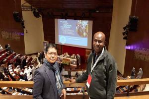 Remy and Theo attending the symposium in Rome.